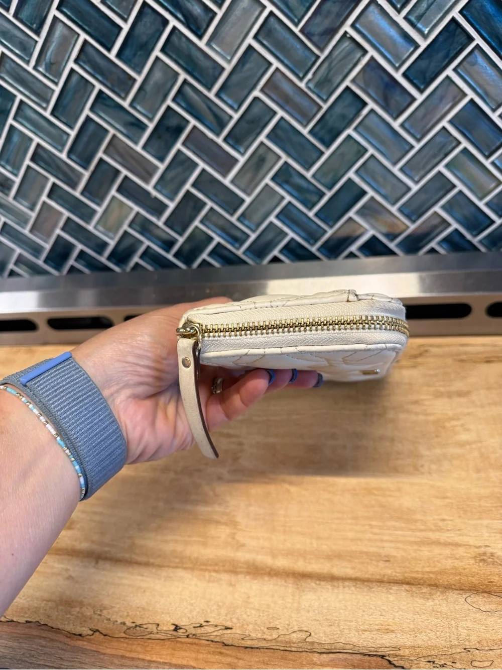 kate spade Quilted Zip-Around Wallet in Ivory